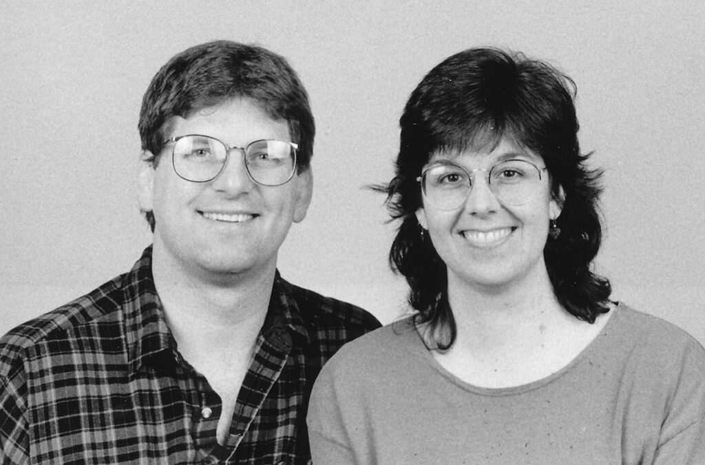 Man and woman posing for a formal photo.