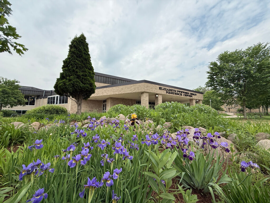 DeBot Dining Center Building in Spring with Flowers and Greenery