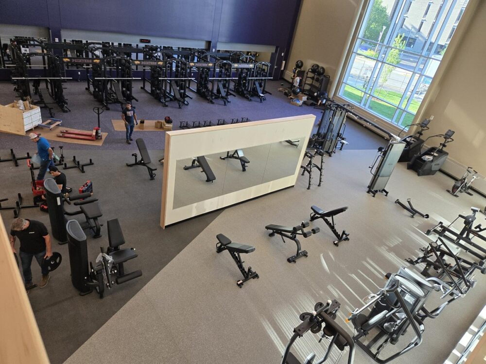 Direct Fitness Solutions installs new exercise equipment inside the Dawg Fitness space inside the new Health and Wellness Center.