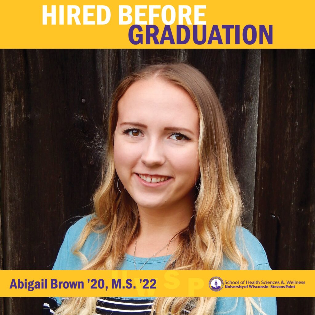 Graduate portrait graphic in front of a wooden wall with “Hired Before Graduation” banner.