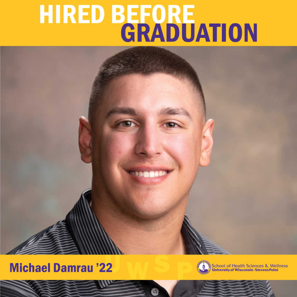 A portrait of a graduate wearing a collared striped shirt with a banner reading “Hired Before Graduation.”