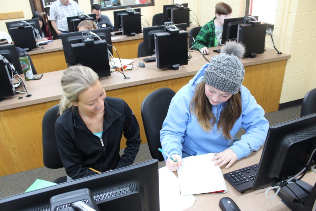student works on problems with a peer in MathPad