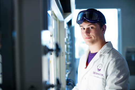 student in lab coat