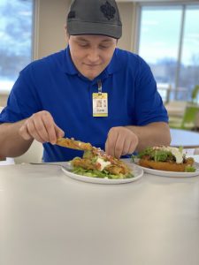 UWSP student eating at the Upper Dining Hall