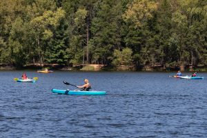 People continuing on the Wisconsin River in the summertime.