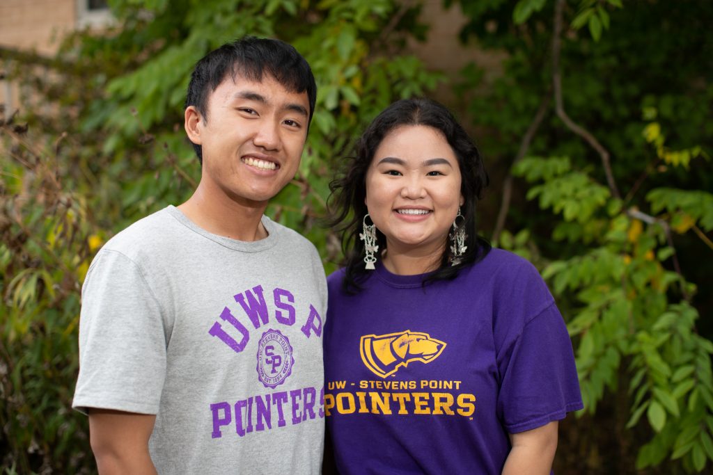 Students standing outside wearing UW-Stevens Point shirts.
