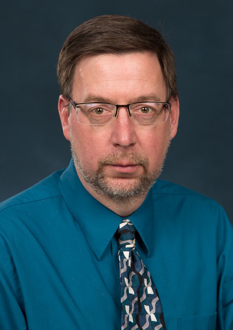 A headshot of professor Paul Doruska.
