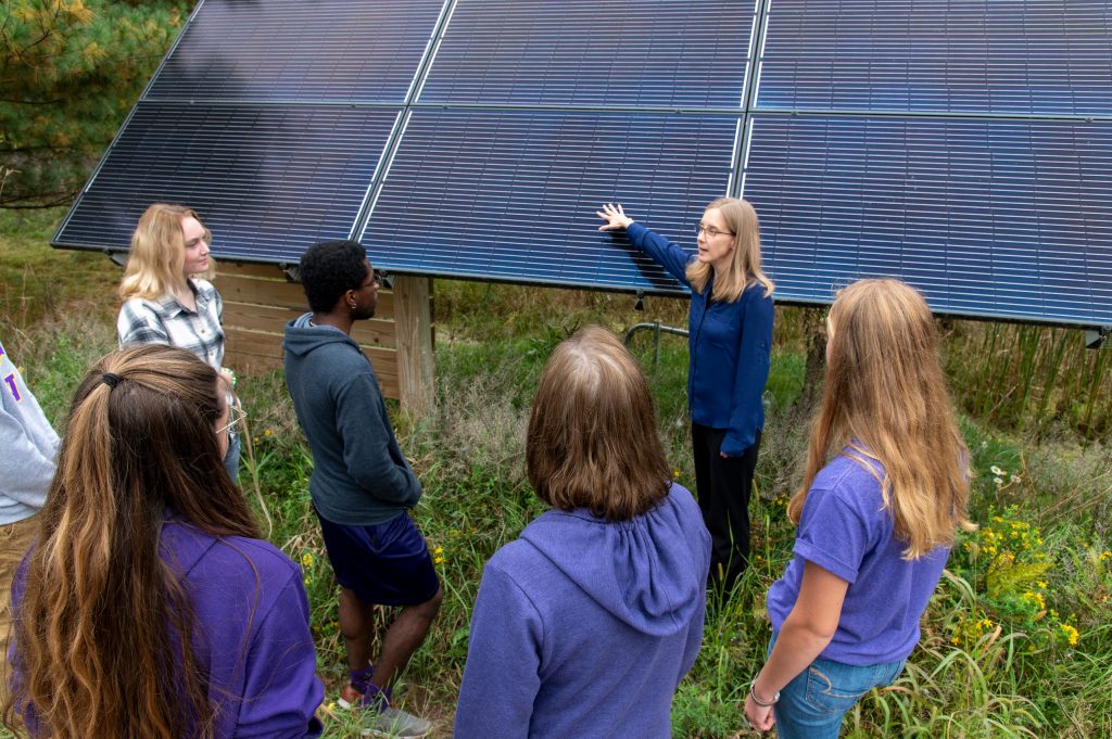 Students looking at our solar panels in Schmeeckle Reserve.