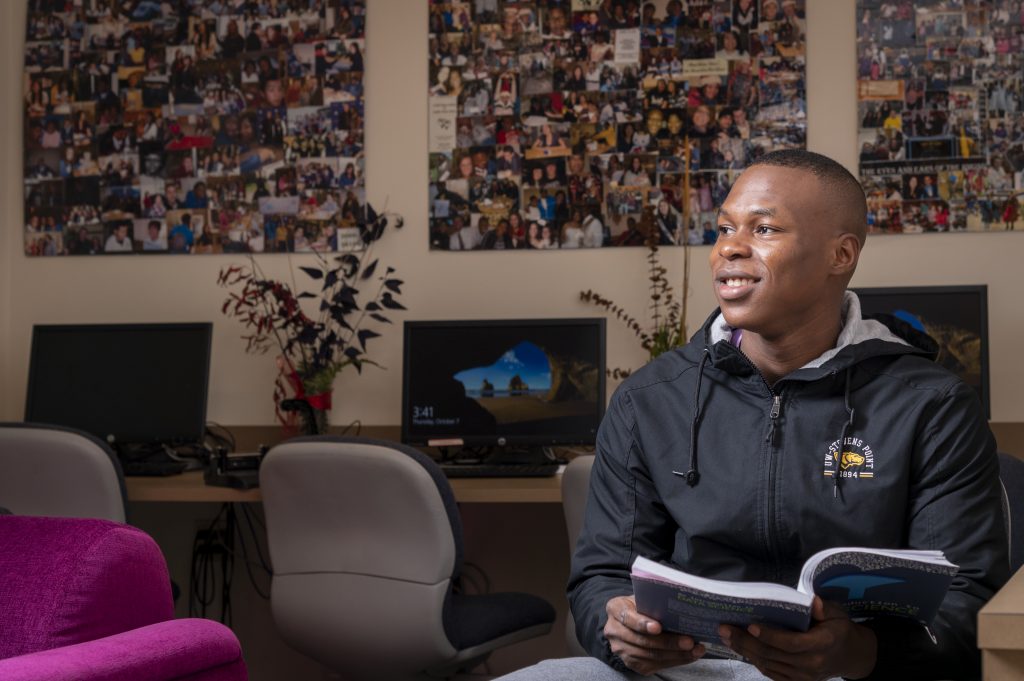 A student studying in the Multicultural Resource Center.