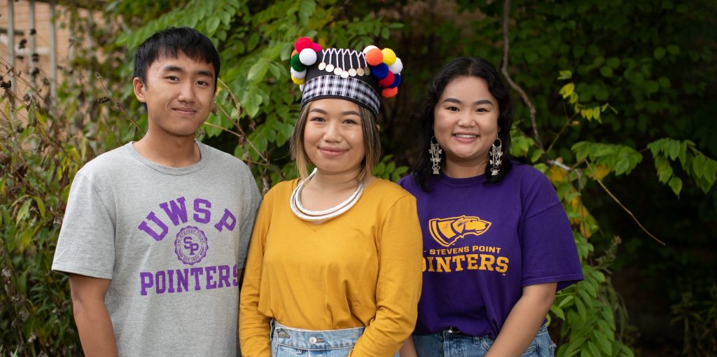 Three members of the Hmong and Southeast Asian American Club.