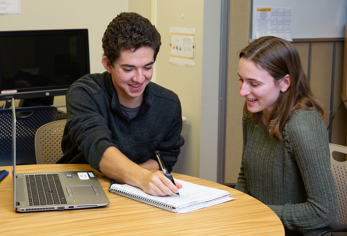 Students demonstrate smart pen technology in the Assistive Technology Center at UWSP.