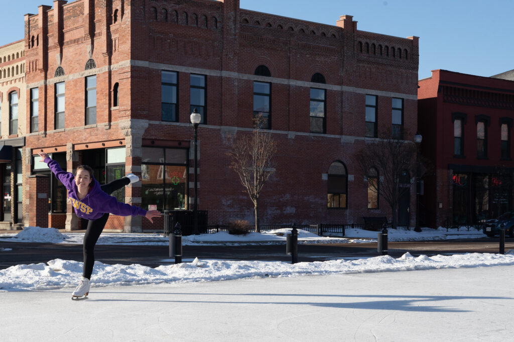 Student skating in downtown Stevens Point