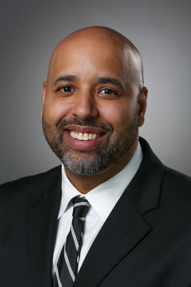 Headshot of male director of Admissions and Recruitment