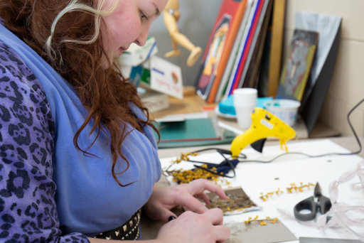A student working on an art project