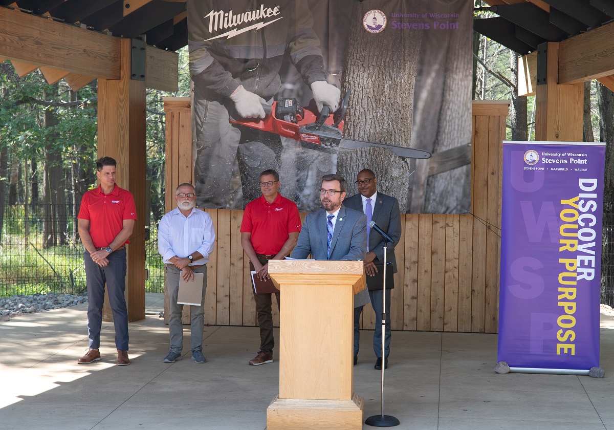 Brian Sloss, dean of the College of Natural Resources, is among those announcing a partnership between at UW-Stevens Point and Milwaukee Tool providing a $1 million tool and equipment endowment. Also present are Milwaukee Tool’s Ryan Schwoegler (left) and Rick Gray, Professor Les Werner and Chancellor Tom Gibson.