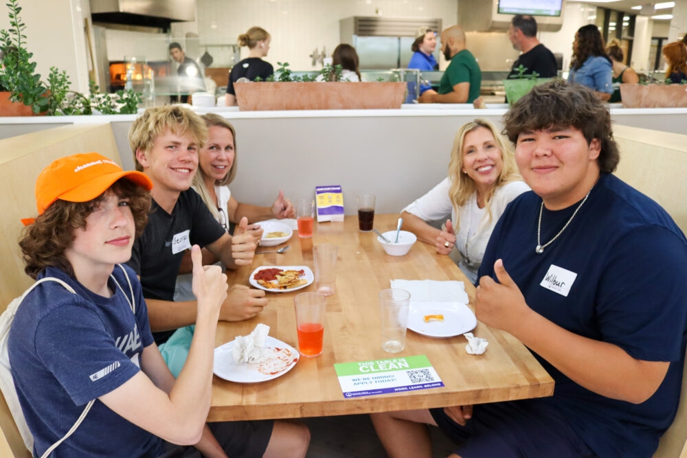 Image of students and parents enjoying a meal at Upper DeBot Dining Center.