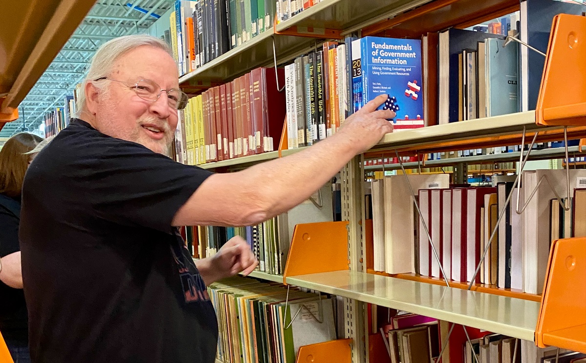 Professor Tom Reich, the library's collection development coordinator and head of acquisitions,