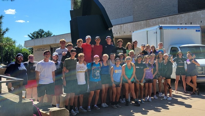 Members of the Pointers tennis and golf team helped move library shelves out of Albertson Hall on Aug. 30.