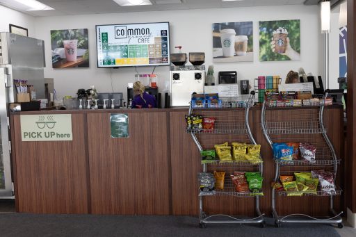 Common Ground Cafe with menu of coffee options, chips, and starbucks logo
