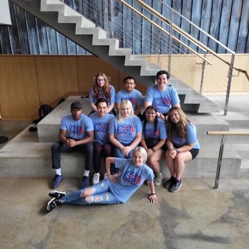 A group of students wearing Upward Bound Program T-shirts.