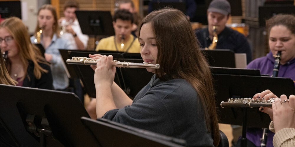 Flute student in band rehearsal