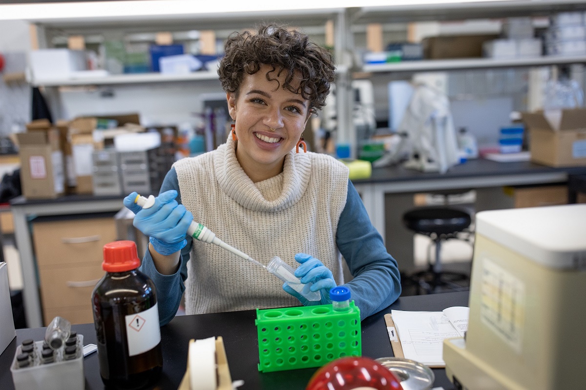 December graduate Chloe Gulbronson worked in a biology, chemistry and physics lab while earning her degree in biochemistry at UWSP.