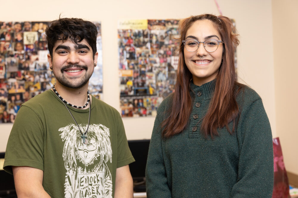 Two members of the Latino Student Alliance smiling.