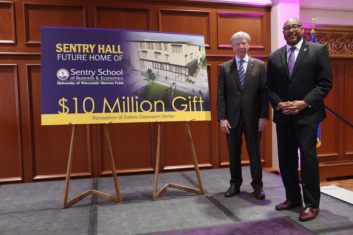 UW-Stevens Point Chancellor Thomas Gibson (right) and Pete McPartland, chairman of the board, president and CEO of Sentry, announce a $10 million gift to the School of Business and Economics today (Dec. 15), the largest gift the university has received.