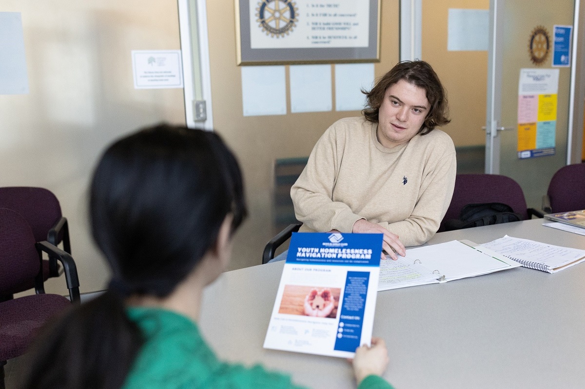 UW-Stevens Point senior Liam Enright, a sociology and social work major, is working as an intern in the Portage County Public Library to connect patrons with social service resources.