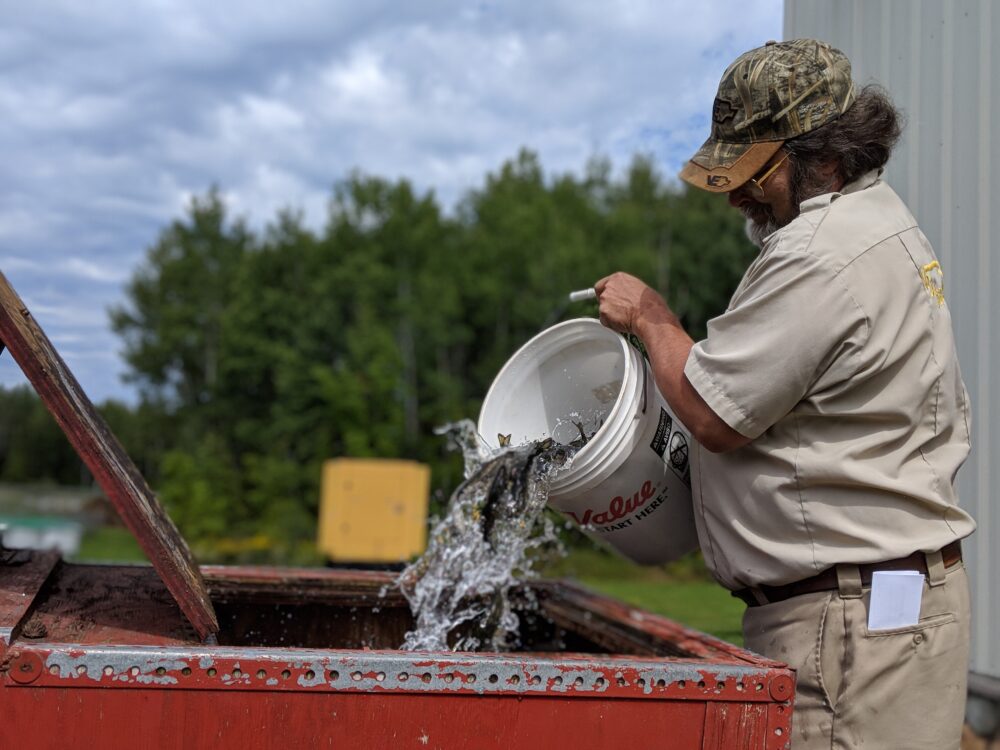 UWSP NADF Donating fish to farmers