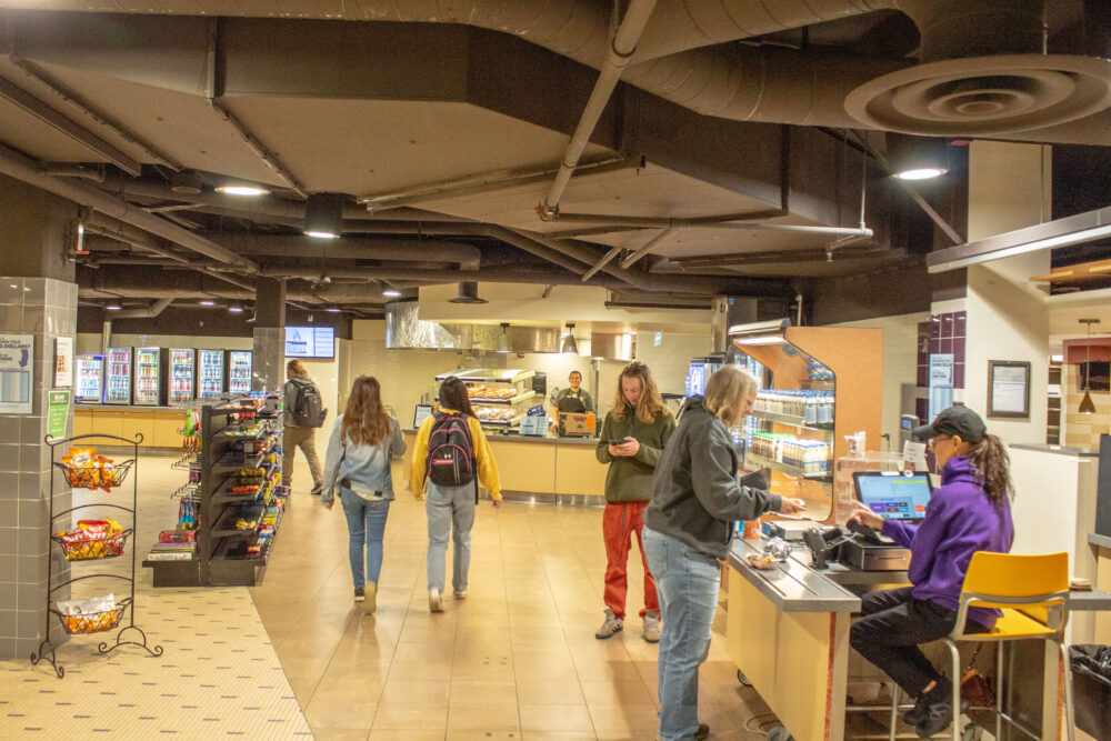 Students walking through the DUC food court