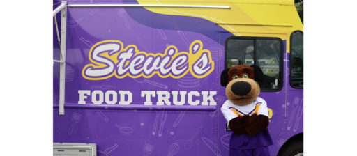 UWSP mascot Stevie posing with steve's food truck