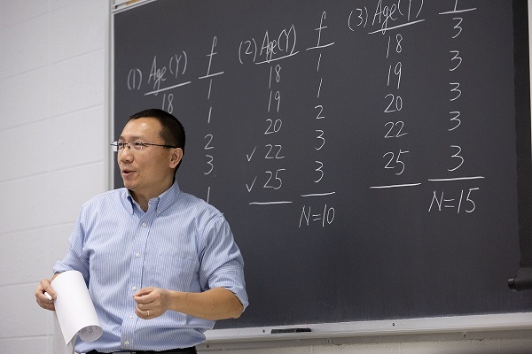 Associate Professor Chunyu in the classroom.