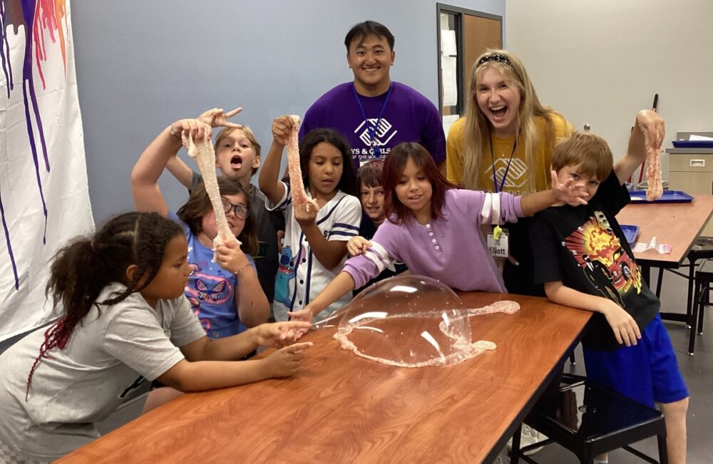 Elliot Becker (back right) was a community health intern at the Boys and Girls Club of the Wausau area over the summer.