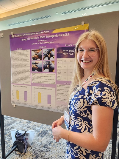 Elliot Becker presents her genetic research on mice at the statewide Quick Pitch competition. Her mentor was Professor Karin Bodensteiner.