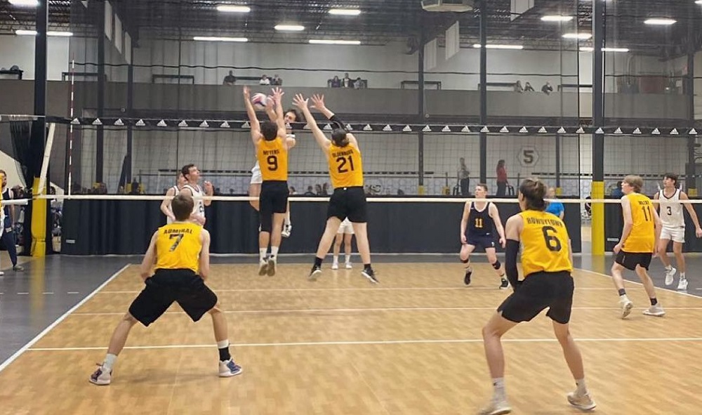 Several members of the men's club volleyball team will join the new men's varsity volleyball team this fall, including Zach Meyers, #9.
