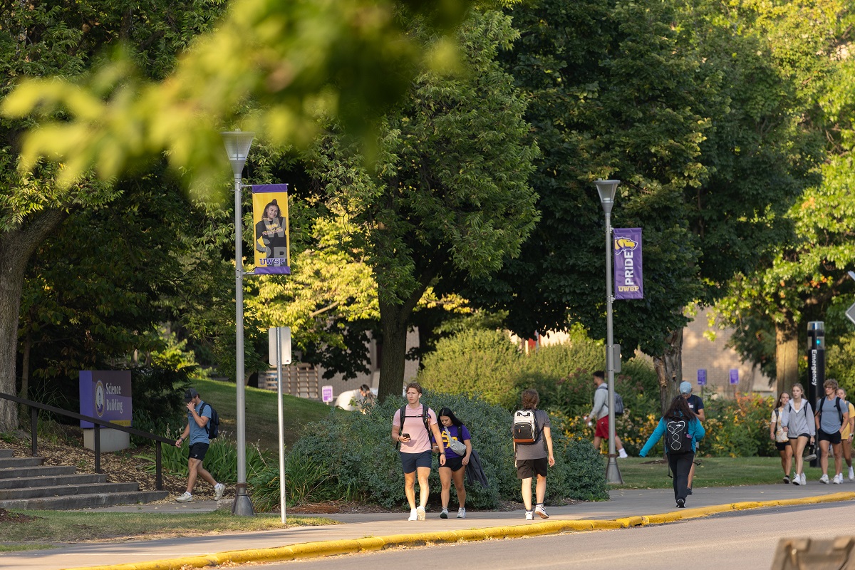 Students walk on campus on the first day of classes at UW-Stevens Point. The university saw an increase in first year, graduate and transfer student enrollment this fall.