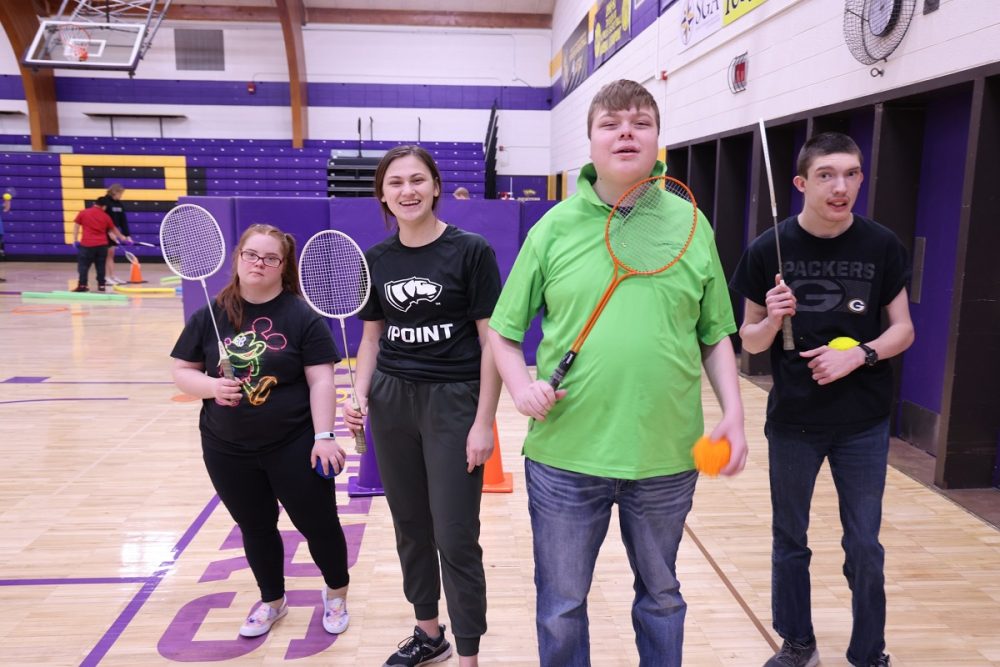 UWSP student Peyton Sevals works with a few Stevens Point students at the Berg Gym on campus.
