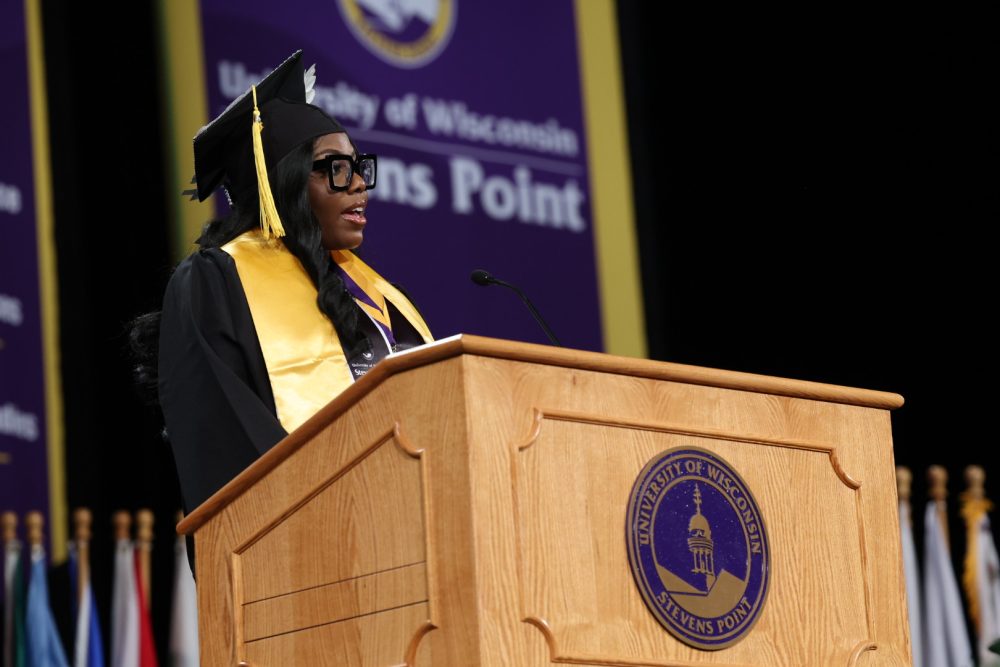 Student Speaker at the podium talking at commencement