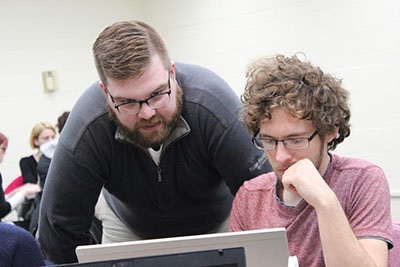 Associate Professor Ross Tangedal, Cornerstone director from 2016 to present, with past editor Jeremy Wolfe.