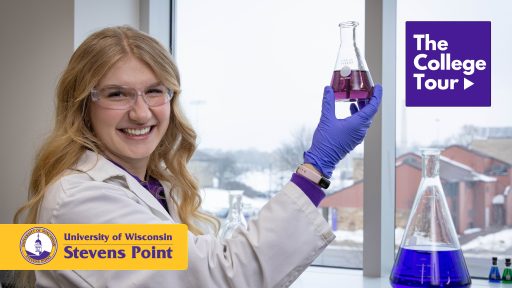 Student holding beaker