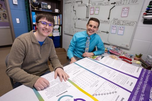 Henry Niedbalski (left), a finance major mentored by Professor Nik Butz, is among the seventeen UWSP students presenting their work at the 20th anniversary Research in the Rotunda.