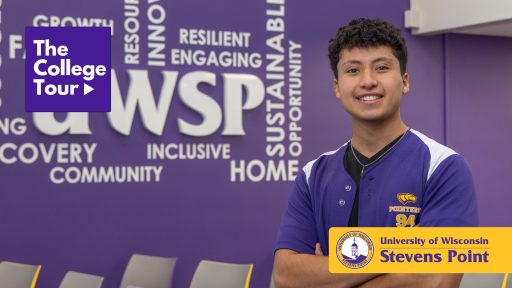 Student Sam Zapata posing in front of a UWSP sign