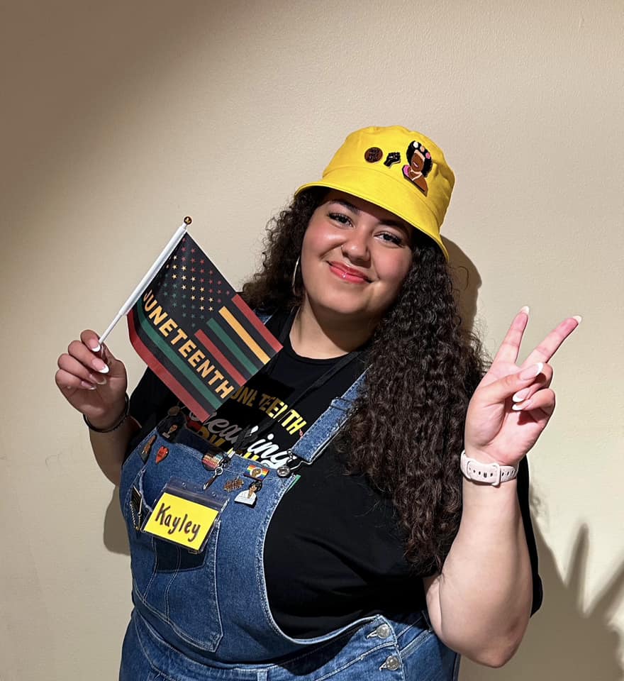 Kayley McColley, a sociology and social work student at UW-Stevens Point, has helped organize Wausau’s Juneteenth celebration for four years and has been involved in several community events that focus on Black history. The Juneteenth flag she holds stands for struggle, strength, growth, hope and equality.