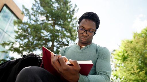 A student reading a book