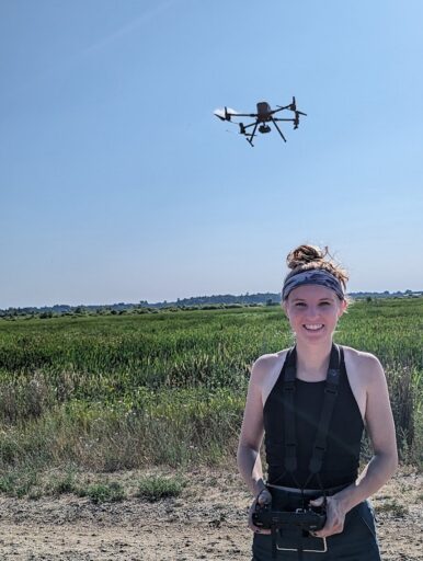 UW-Stevens Point graduate student Amanda Griswold operates a drone for her research on waterfowl conservation.