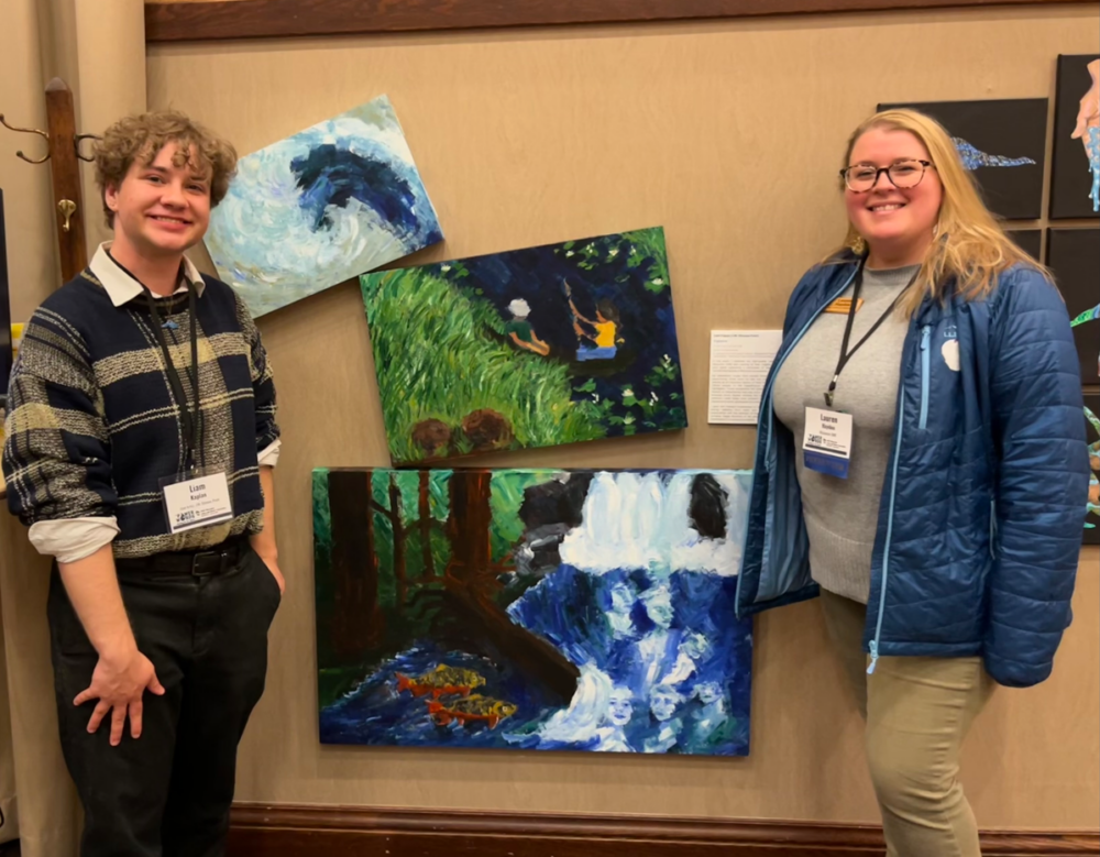 UWSP student Liam Kaplan paired with Lauren Haydon, a watershed protection coordinator with the Wisconsin DNR to create art on Wisconsin watersheds. The exhibit debuted at the Wisconsin Lakes and Rivers Convention in Stevens Point March 26.