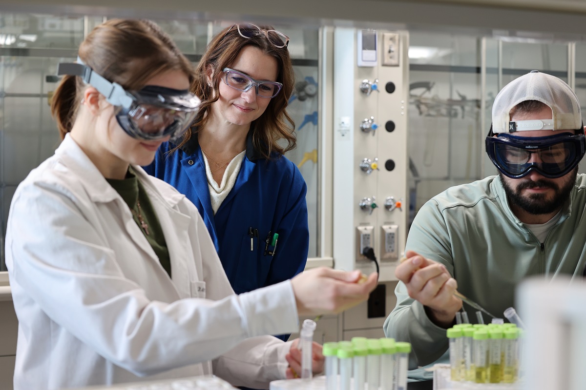 2 students and Professor Shannon Riha in a lab