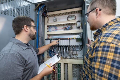 Documenting information from control cards housed inside a process control cabinet.